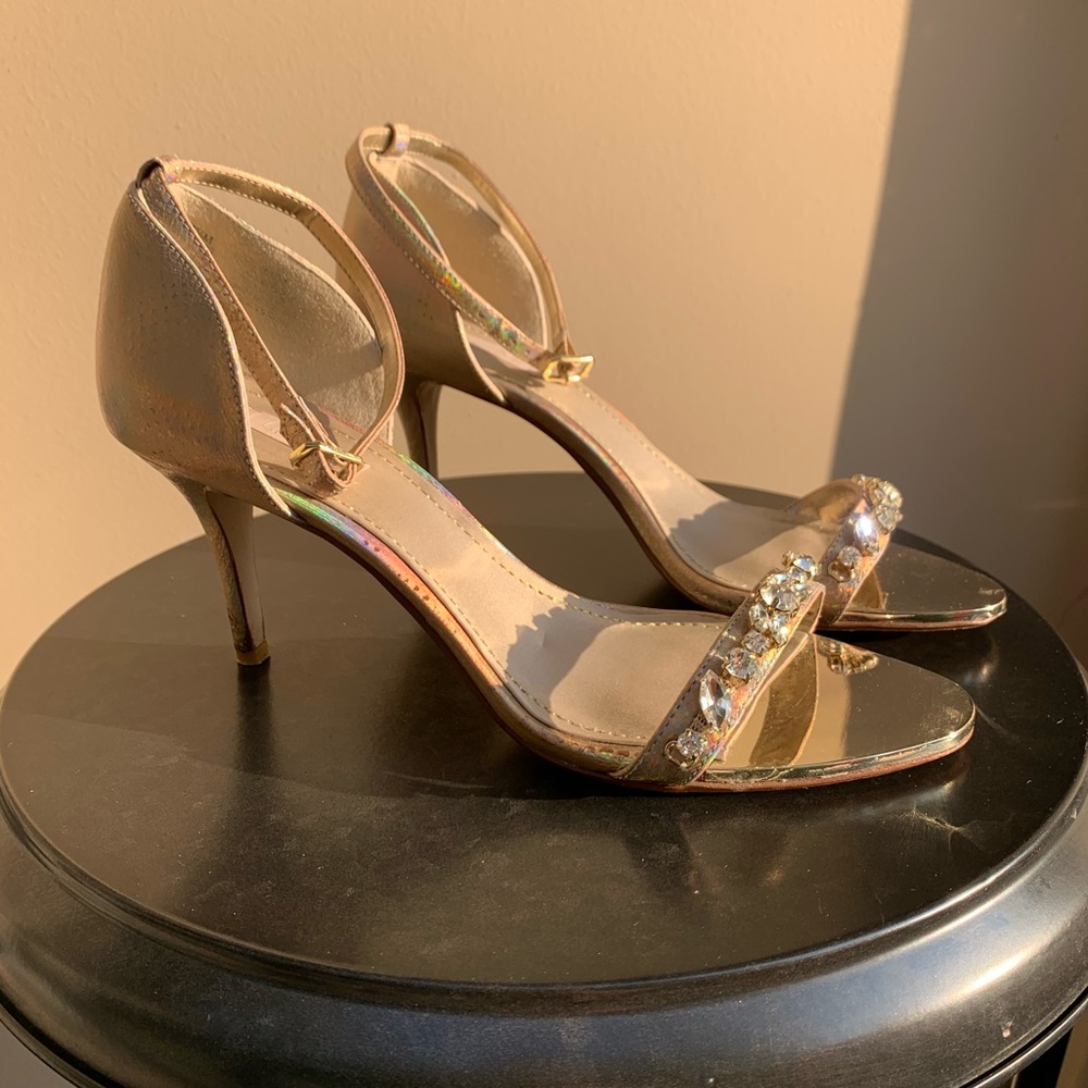 Glitzy rhinestoned ankle-strapped heels